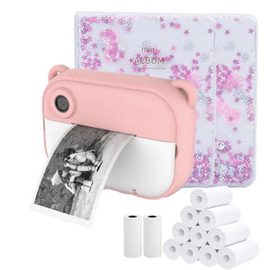 pink kid instant print camera with black and white photo, purple mini album, and thermal paper rolls bundle
