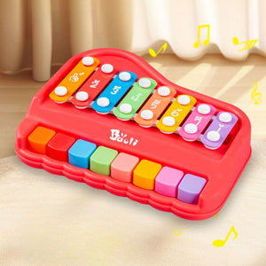 Colorful kids wooden eight-tone percussion xylophone educational toy with mallets on white background