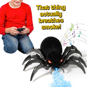 Remote control spider toy spraying blue smoke with glowing red eyes and a child holding the wireless remote