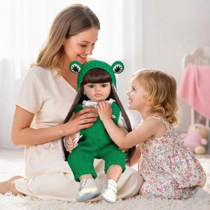 Real-feel baby doll with lifelike features held by mother and daughter in cozy home setting