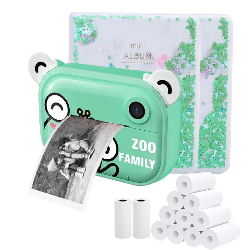 Green kid instant print camera with bear ears printing black and white photo, mini photo album, and thermal paper rolls.