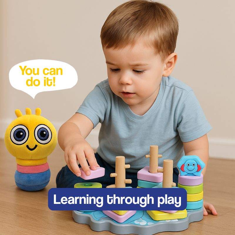 Soft white Boolby plush toy with big expressive eyes, a perfect learning buddy for kids aged 0-10+ encouraging curiosity and confidence
