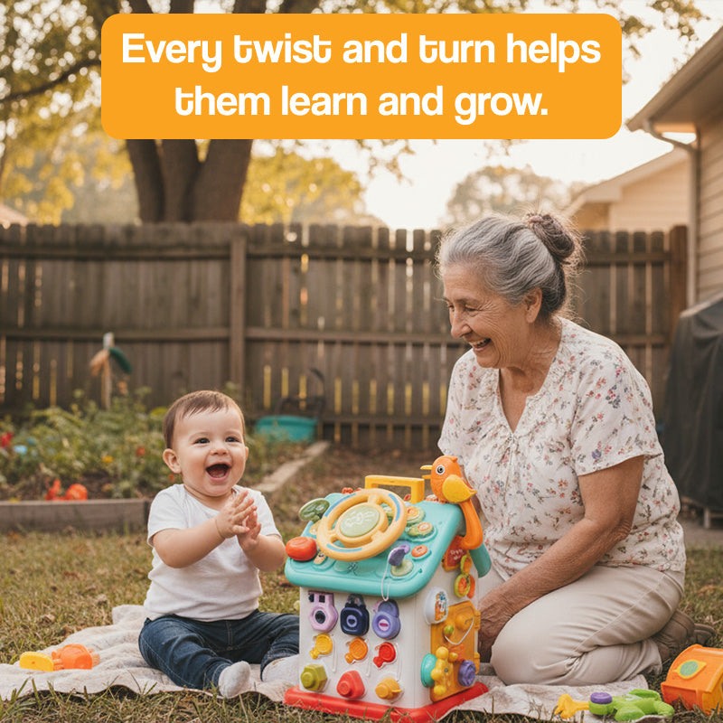 Toddler playing with Montessori Busy House toy for fine motor skills alongside smiling elderly woman outdoors