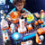 Child playing with STEM electronic building blocks set featuring rockets, astronauts, and scientific components