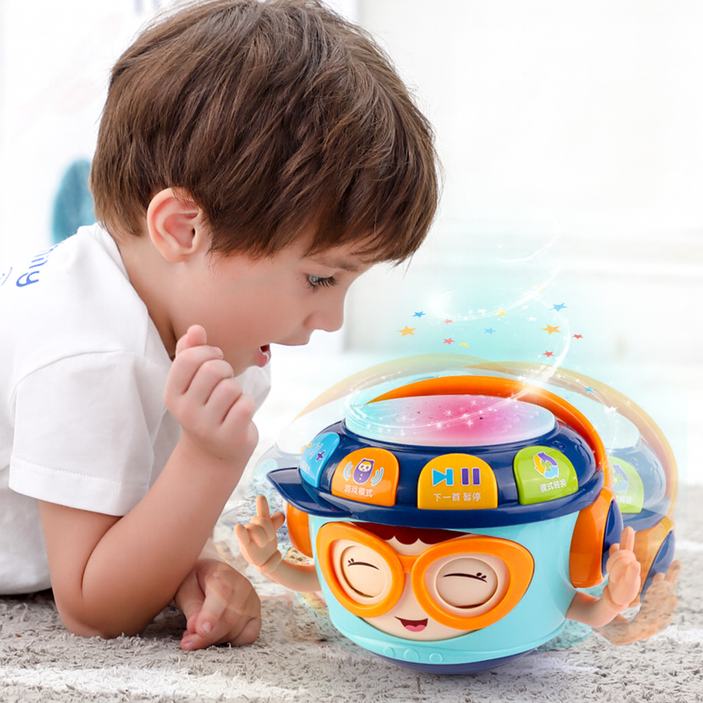 Infant playing with colorful music projection hand-pat drum educational toy designed for early development and sensory play.