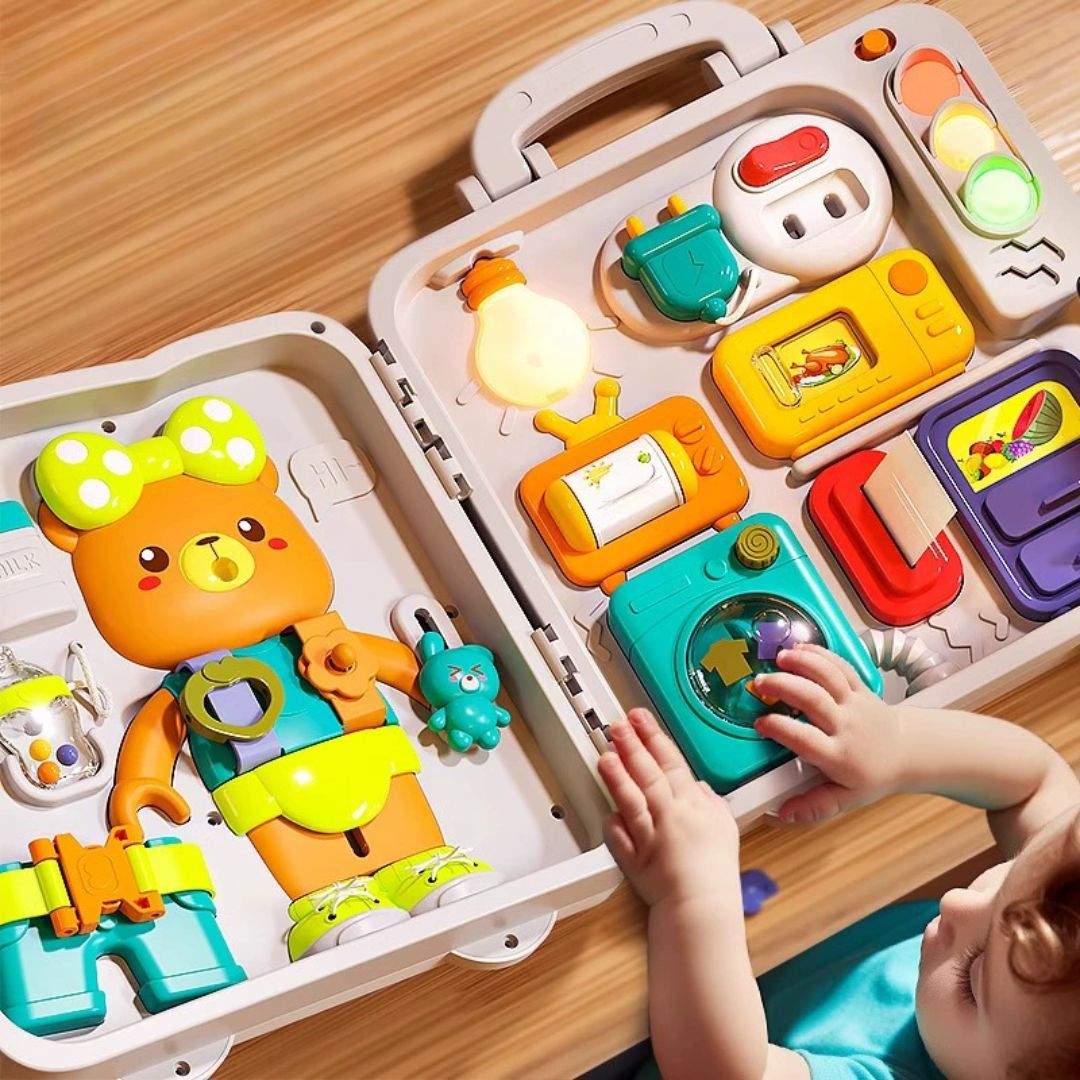 Busy Board Montessori educational toy with interactive buttons, flashing lights, and safe plastic design for infants aged 1-3 years.