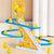 Little Duck Electric Climbing Stairs Slide Toy with yellow duck figures, blue spiral slide, and interactive lights and music for toddlers aged 0-3 years.