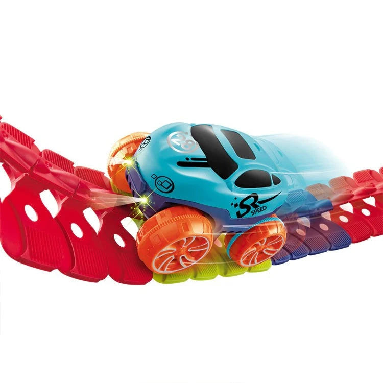 LED-lit blue toy car racing on flexible red anti-gravity track with loops and stunts
